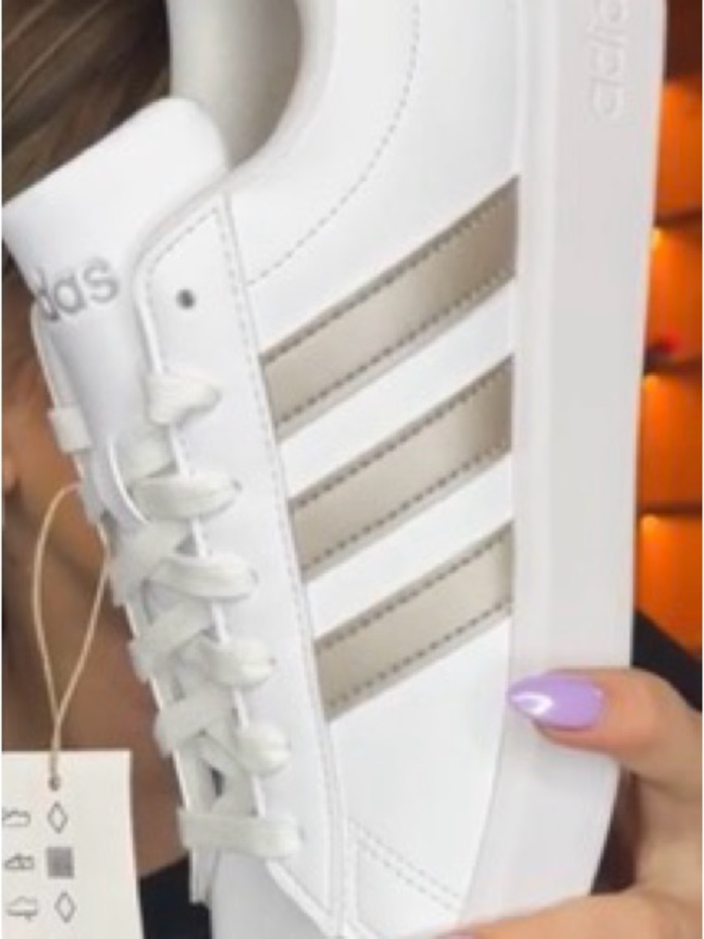 adidas White Sneakers with Metallic Gold Stripe Accents